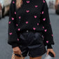All over heart sweater