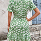 Tied Printed V-Neck Flounce Sleeve Mini Dress