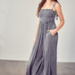 FRONT CHEST V LINE SMOCKED JUMPSUIT